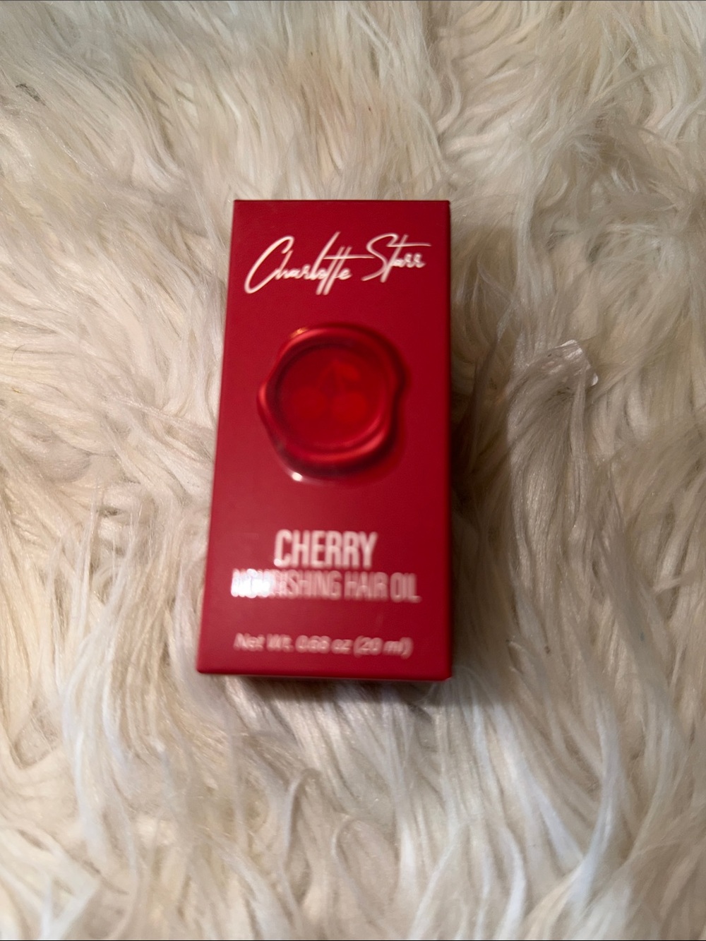 Charlotte Tilbury Cherry Nourishing Hair Oil - red packaging